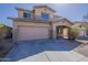 Charming two-story home featuring a two-car garage and covered entryway in a well-maintained community at 9939 W Southgate Ave, Tolleson, AZ 85353
