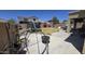 Expansive backyard features a trampoline and a covered patio, great for leisure and outdoor activities at 10036 W Chipman Rd, Tolleson, AZ 85353