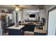 Modern kitchen features stainless steel appliances, butcher block countertops, and functional island at 10036 W Chipman Rd, Tolleson, AZ 85353