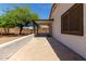 Enjoy this covered back patio, perfect for relaxing or entertaining outdoors at 10408 W Miami St, Tolleson, AZ 85353