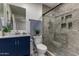 Stylish bathroom featuring a modern vanity and a glass-enclosed shower at 10408 W Miami St, Tolleson, AZ 85353