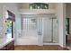 Bright bathroom with a glass-enclosed shower, tub, and ample natural light at 11253 E Peterson Ave, Mesa, AZ 85212