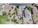 Overhead aerial of pool in backyard, home with patio and two-car garage at 11965 W Monte Vista Rd, Avondale, AZ 85392