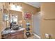Bathroom showcasing dual vessel sinks, granite countertops, and a glass-enclosed shower at 11965 W Monte Vista Rd, Avondale, AZ 85392