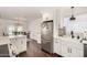 Modern kitchen featuring white cabinets, stainless steel appliances, and an open layout at 1209 W Colter St, Phoenix, AZ 85013