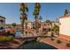 Beautiful community pond and landscaping at this multi-level condo complex at 12123 W Bell Rd # 211, Surprise, AZ 85378