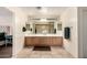 Bathroom boasts a double vanity, modern lighting and lots of space at 13324 W Annika Dr, Litchfield Park, AZ 85340