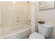Clean bathroom featuring a shower-tub combination and modern toilet at 13324 W Annika Dr, Litchfield Park, AZ 85340