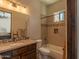 Comfortable bathroom with tiled shower, vanity and sink under bright vanity lights at 14332 E Bobwhite Way, Scottsdale, AZ 85262