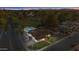 Aerial view of a beautiful home with a backyard pool and golf course nearby at 1509 W Kiowa Ave, Mesa, AZ 85202