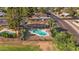 Gorgeous aerial view featuring a blue swimming pool and a well maintained fenced-in back yard at 1509 W Kiowa Ave, Mesa, AZ 85202