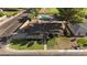 Aerial shot highlighting the home's layout, including the pool and proximity to the golf course at 1509 W Kiowa Ave, Mesa, AZ 85202