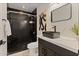 Beautiful bathroom featuring a modern vanity, sink, and a luxurious walk-in shower at 1509 W Kiowa Ave, Mesa, AZ 85202