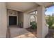 Inviting front entrance features patterned tile, pot with greenery, and unique brickwork at 1509 W Kiowa Ave, Mesa, AZ 85202