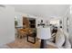 Open concept living room with access to dining room and kitchen at 1509 W Kiowa Ave, Mesa, AZ 85202