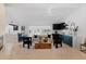 Bright living room with modern lighting, tile flooring, fireplace, and stylish decor at 1509 W Kiowa Ave, Mesa, AZ 85202