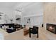 Cozy living area boasts stylish decor, modern lighting, and elegant fireplace at 1509 W Kiowa Ave, Mesa, AZ 85202