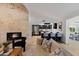 Spacious living room features a modern kitchen, fireplace and contemporary decor at 1509 W Kiowa Ave, Mesa, AZ 85202