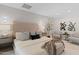 Nicely staged main bedroom with upholstered headboard and side tables at 1509 W Kiowa Ave, Mesa, AZ 85202