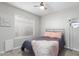 Cozy bedroom with a ceiling fan, and natural light, perfect for relaxation at 15610 N 29Th St # 3, Phoenix, AZ 85032
