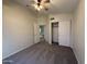 Bedroom with carpet, ceiling fan and a window at 16784 W Polk St, Goodyear, AZ 85338