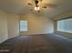 Spacious bedroom is carpeted and features lots of natural light at 16784 W Polk St, Goodyear, AZ 85338