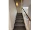 Carpeted staircase ascends to the upper level at 16784 W Polk St, Goodyear, AZ 85338