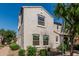 An exterior view of a modern two-story home with a well-kept front yard at 1700 S Martingale Rd, Gilbert, AZ 85295