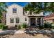 Charming two-story home with a covered front porch and manicured landscaping, great for curb appeal at 1700 S Martingale Rd, Gilbert, AZ 85295