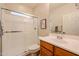 Bathroom with a single sink, tiled flooring, and a glass shower at 17516 W Glenhaven Dr, Goodyear, AZ 85338