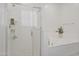 Modern bathroom featuring a glass-enclosed shower and a separate soaking tub in a bright space at 17721 W Cassia Way, Goodyear, AZ 85338