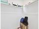 Brightly lit closet space with ample shelving and some personal items staged at 17721 W Cassia Way, Goodyear, AZ 85338