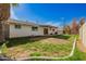 Lush backyard with grass area, patio, and mature landscaping provides a relaxing outdoor space at 1845 N 64Th St, Scottsdale, AZ 85257