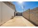 Extended concrete patio in the backyard, perfect for entertaining and outdoor activities at 1845 N 64Th St, Scottsdale, AZ 85257