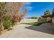 Backyard featuring a large patio area and grass, great for outdoor living and relaxation at 1845 N 64Th St, Scottsdale, AZ 85257