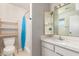 The bathroom features a tile shower, toilet, and a vanity with a medicine cabinet at 1845 N 64Th St, Scottsdale, AZ 85257