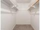 Walk-in closet with shelves and rod for ample storage at 1845 N 64Th St, Scottsdale, AZ 85257