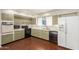 Well-lit kitchen provides lots of counter space, an oven, microwave and a dishwasher at 1845 N 64Th St, Scottsdale, AZ 85257