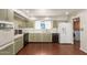 Functional kitchen has essential appliances, ample counter space, and backyard views at 1845 N 64Th St, Scottsdale, AZ 85257