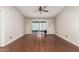 Open floor plan offers a cozy living room with ceiling fan and backyard access at 1845 N 64Th St, Scottsdale, AZ 85257