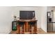 Close-up of the wet bar featuring custom wood and an beverage refrigerator at 19230 N 5Th St, Phoenix, AZ 85024