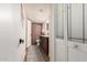 Bathroom view from hallway with accent rug and vanity at 19230 N 5Th St, Phoenix, AZ 85024