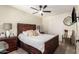 Bedroom with a wooden headboard bed and a ceiling fan at 19230 N 5Th St, Phoenix, AZ 85024