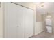 Hallway with a wall closet and stairway leading to the second floor at 19230 N 5Th St, Phoenix, AZ 85024