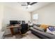 Office featuring desk area and relaxing gray sofa for study and relaxation at 19230 N 5Th St, Phoenix, AZ 85024