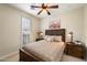 Comfortable bedroom with natural light and rustic wood furniture at 2470 E Roma Ave, Phoenix, AZ 85016