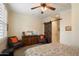 Relaxing bedroom featuring a barn door and comfortable furniture at 2470 E Roma Ave, Phoenix, AZ 85016