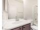 Bathroom featuring a sink, a large mirror, a toilet and a shower/tub combination at 2556 W Amber Sun Dr, Phoenix, AZ 85085