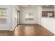 Bright dining area with tile floors and sliding glass door, open to the kitchen, perfect for entertaining at 2556 W Amber Sun Dr, Phoenix, AZ 85085