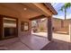 Covered patio offering a great outdoor living space and desert landscaping at 2556 W Amber Sun Dr, Phoenix, AZ 85085